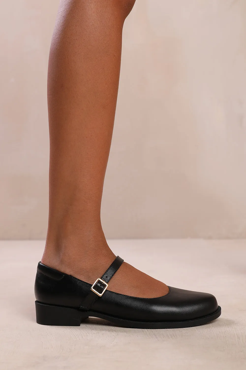 KINGSTON EXTRA WIDE FIT LOW HEEL LOAFER WITH STRAP AND BUCKLE DETAIL IN BLACK FAUX LEATHER