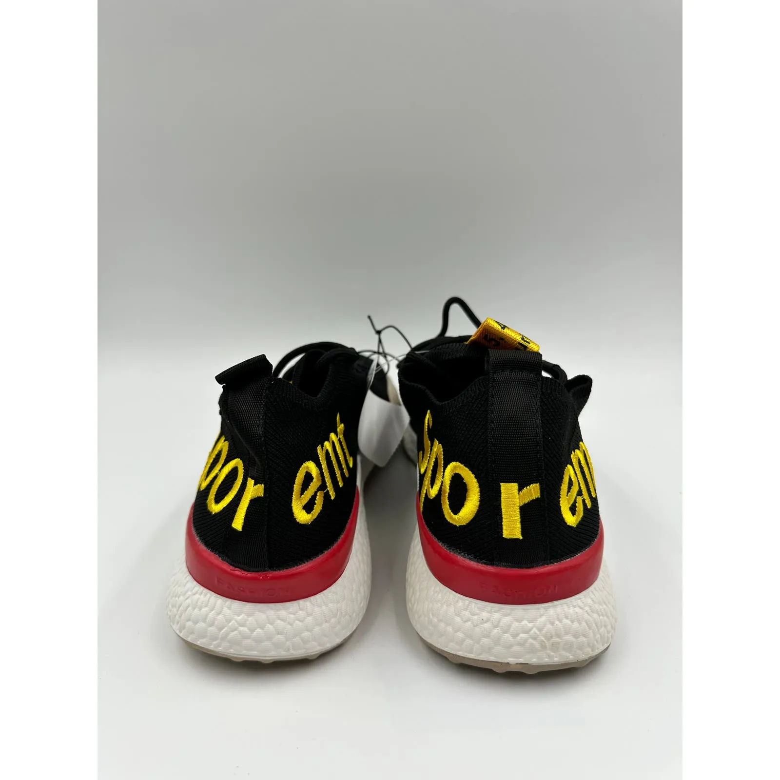 Men's Size 8.5, Black Knit Top Sneakers with Yellow and Red Accents